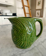 Load image into Gallery viewer, Vintage Green Pottery Pitcher with Fish Motif
