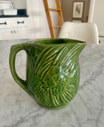 Load image into Gallery viewer, Vintage Green Pottery Pitcher with Fish Motif
