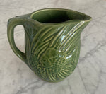 Load image into Gallery viewer, Vintage Green Pottery Pitcher with Fish Motif

